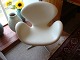 Swan chair in white leather designed by Arne Jaboksen jubilærumsmode 5000 m2 showroom