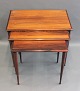 3 nestling tables in rosewood from B C furniture.The tables are of Danish design and from the 1960s.5000m2 showroom.