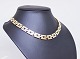 Necklace of 14 ct. gold and stamped Hr.V.
5000m2 showroom.
