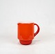 Red glass jug with white opaline glass on the inside from the Palet series by 
Michael Bang for Holmegaard.
5000m2 showroom.

