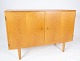 Sideboard in oak designed by Poul Hundevad from the 1960s.5000m2 showroom.