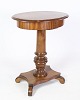 Oval sewing table / lamp table on pillar with mahogany sewing room from around the 1890s.