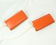 Wall lamps, orange colour, Danish design, 1970s.