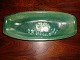 Oval dish with a green glaze with a sketch of a bear.L: 33 cm. 5000m2 showroom.